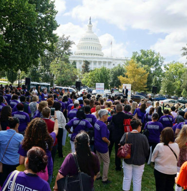 group of people uniting together inthe park