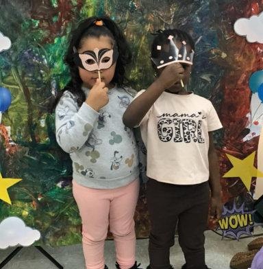 two kids using a mask