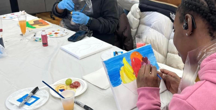 female teacher and kids smiling