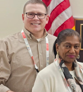 man and woman smiling